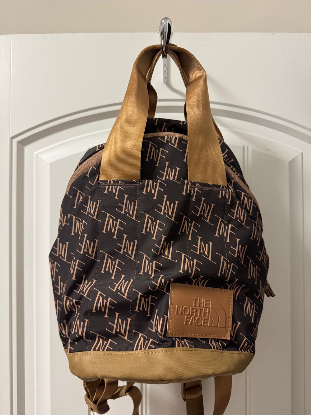 The North Face Brown Logo-Print Mini Backpack with Tan Accents
